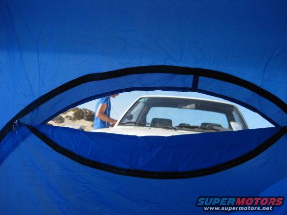 1989 Toyota Pickup/SR5 front view through a blue tent opening