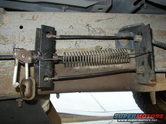 family-027.jpg parking brake cable stretched  so i wrapped wire around it to make it tighter
