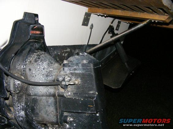 Black boat outdrive with a serial number plate