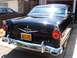 1956 Ford Fairlane - Rear view of a black 1956 Ford Fairlane with a California license plate.