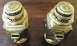 1912 Ford Model T - Pair of 1912 Ford Model T carbide lamps, showing embossed Ford logos on the caps.