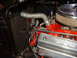 1956 Ford Fairlane - Close-up of a 1956 Ford Fairlane engine bay, showing the 'Thunderbird' branding on the valve cover.