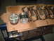 1969 Ford Torino - Engine components, including pistons and connecting rods, are arranged on a piece of cardboard.