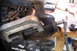 1989 Ford Bronco - The ball joint press in action. In this photo the upper ball joint is coming out. You have to do the lower first in ord…