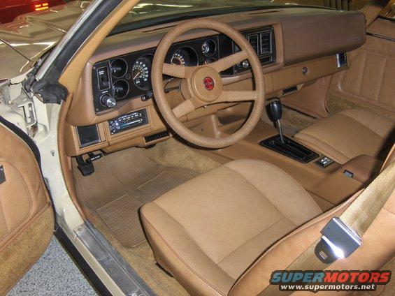 1979 Chevrolet Camaro interior with tan seats, dashboard, and steering wheel
