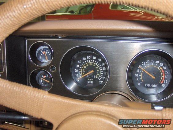 1979 Chevrolet Camaro interior dashboard with speedometer, tachometer, and fuel gauge visible