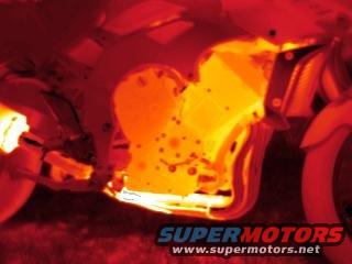 Motorcycle engine with heat signatures, Supermotors logo visible