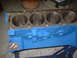 1969 Ford Torino - Engine block with four cylinders, painted bright blue.
