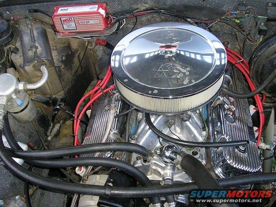 Engine bay with chrome valve covers, K&N air filter, and MSD ignition box