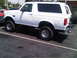 1986 Ford Bronco - This white Ford Bronco appears to be from the 1992-1996 generation, not a 1986 model.