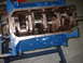 1969 Ford Torino - Close-up view of an engine block's internal components, including the crankshaft and connecting rods, painted blue.