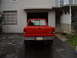 1997 Ford Ranger - A red 1997 Ford Ranger pickup truck is parked in front of a house.
