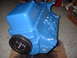 1969 Ford Torino - A freshly painted blue engine block sits on a wooden surface, ready for installation.