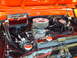 1992 Ford Bronco - Close-up of a custom engine bay, chrome accents and an aftermarket air filter.