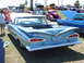 1992 Ford Bronco - A light blue 1959 Chevrolet El Camino convertible displays its distinctive fins at a car show.