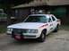 1991 Ford Crown Victoria - This 1991 Ford Crown Victoria police car is equipped with a light bar and sirens, and is marked for 'Fire Chief' and 'Cold City'.