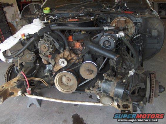 Engine bay with V8 engine and front suspension components