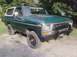 1979 Ford Bronco - This 1978 Ford Bronco features a bull bar and a hood scoop, with a "Kathy's Pit Stop" sticker on the windshield.