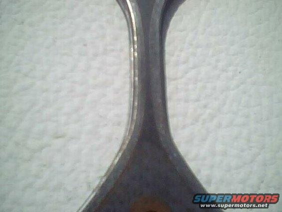 chrome trim piece with a textured background