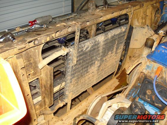 Radiator and engine components with tools on top