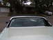 1973 Ford Ranchero - Rear view of a 1973 Ford Ranchero, showing its white bed and black vinyl roof.
