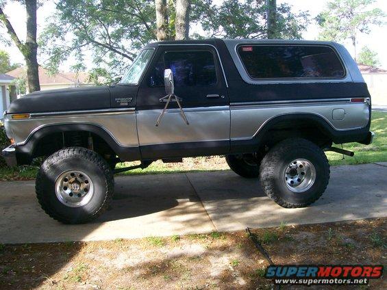 Lifted Ford Bronco with two-tone paint and large off-road tires