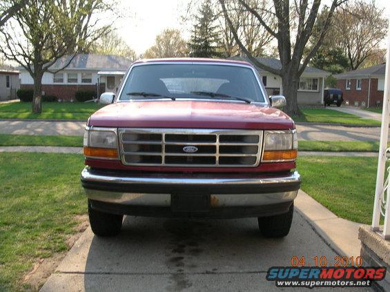 Front view of red Ford F-Series truck, likely 1992-1996 model year