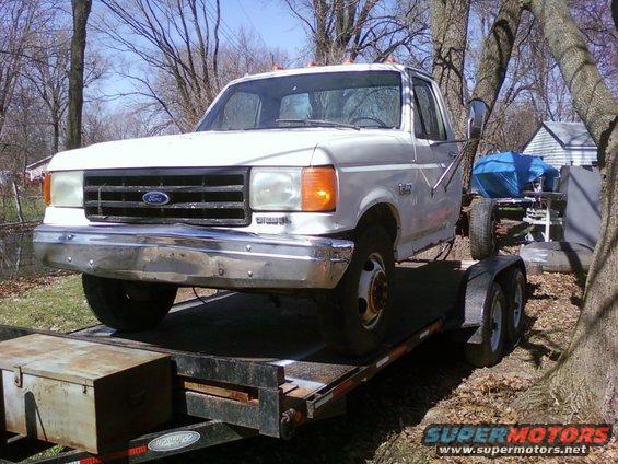 1987 Ford F-Series truck on a trailer, front view