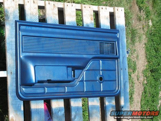 blue door panel on wooden pallet