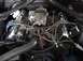 1968 Ford Mustang - Engine bay detail with carburetor and wiring visible.