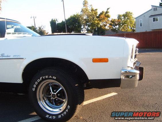 White 1973 Ford Ranchero 500 with chrome bumper and Goodyear Eagle GT II tires