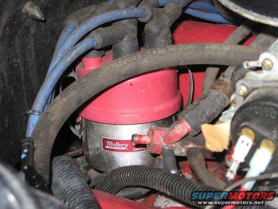 Close-up of a Mallory ignition distributor with blue spark plug wires