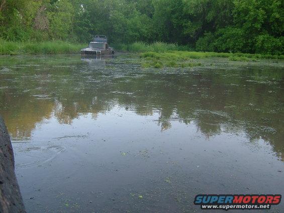 1978 Chevrolet C/K Pickup stuck in water, 3q-front view