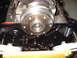 1956 Ford Crown Victoria - The front of an engine block with the crankshaft pulley assembly attached.