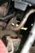 1976 Ford Ranchero - Underside view of vehicle exhaust and suspension parts, showing rust.