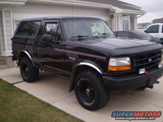 Black 1996 Ford Bronco parked in a driveway