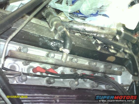 pict0019.jpg Cleaned spark plug wires and valley between cam covers.