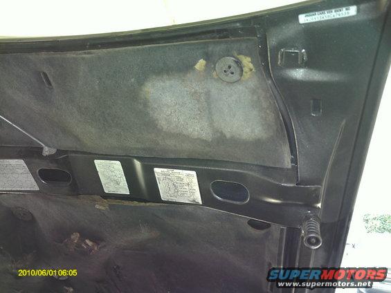Upper corner of the hood was rusting from battery acid, cleaned and refinished with Dupli-Color wheel paint in Graphite that matches the Dorchester gray Jag color well enough for underhood use.