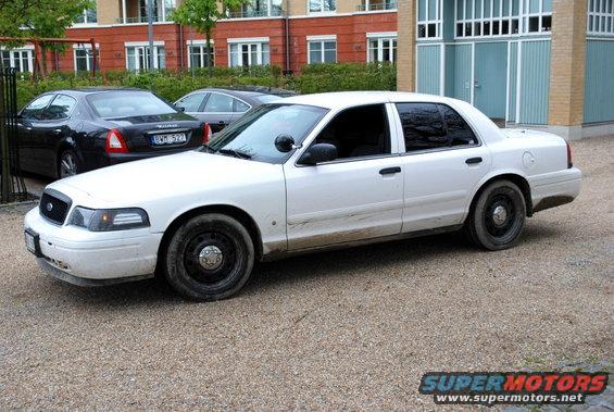 White 1998 Ford Crown Victoria sedan, 3q front view