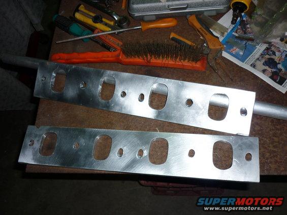 p1000174.jpg Starting to make my intake manifold, cut it out with a die grinder.