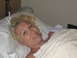 2001 Pontiac Trans Am - Mother and newborn baby resting in a hospital bed after birth.