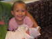 2001 Pontiac Trans Am - A young girl proudly holds her new sibling.