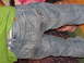 2001 Pontiac Trans Am - Close-up of light blue denim jeans with decorative stitching on back pockets.