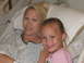 2001 Pontiac Trans Am - A woman and a young girl are in hospital beds, both smiling for the camera.