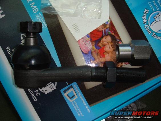 Tie rod end with castle nut and jam nut