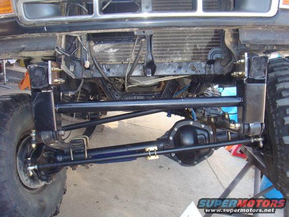 1992 Ford Bronco front axle with upgraded suspension components and large tires