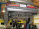 1985 Ford Mustang - Underside view of a 1985 Ford Mustang, showing the fuel tank and exhaust system.