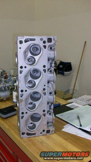 102_1308.jpg Heads have been cleaned and glass-bead blasted, ready to go to the machine shop