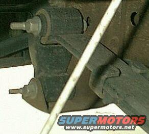 stockshackle.jpeg This is what a stock setup will look like.  This shackle is said to be "in tension"