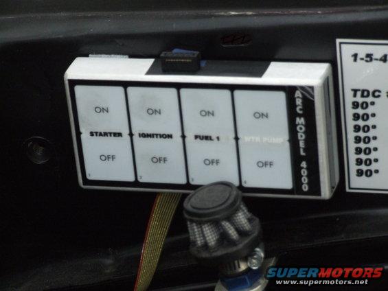 Close-up of an ARC Model 4000 switch panel with labels for starter, ignition, fuel 1, and wtr pump